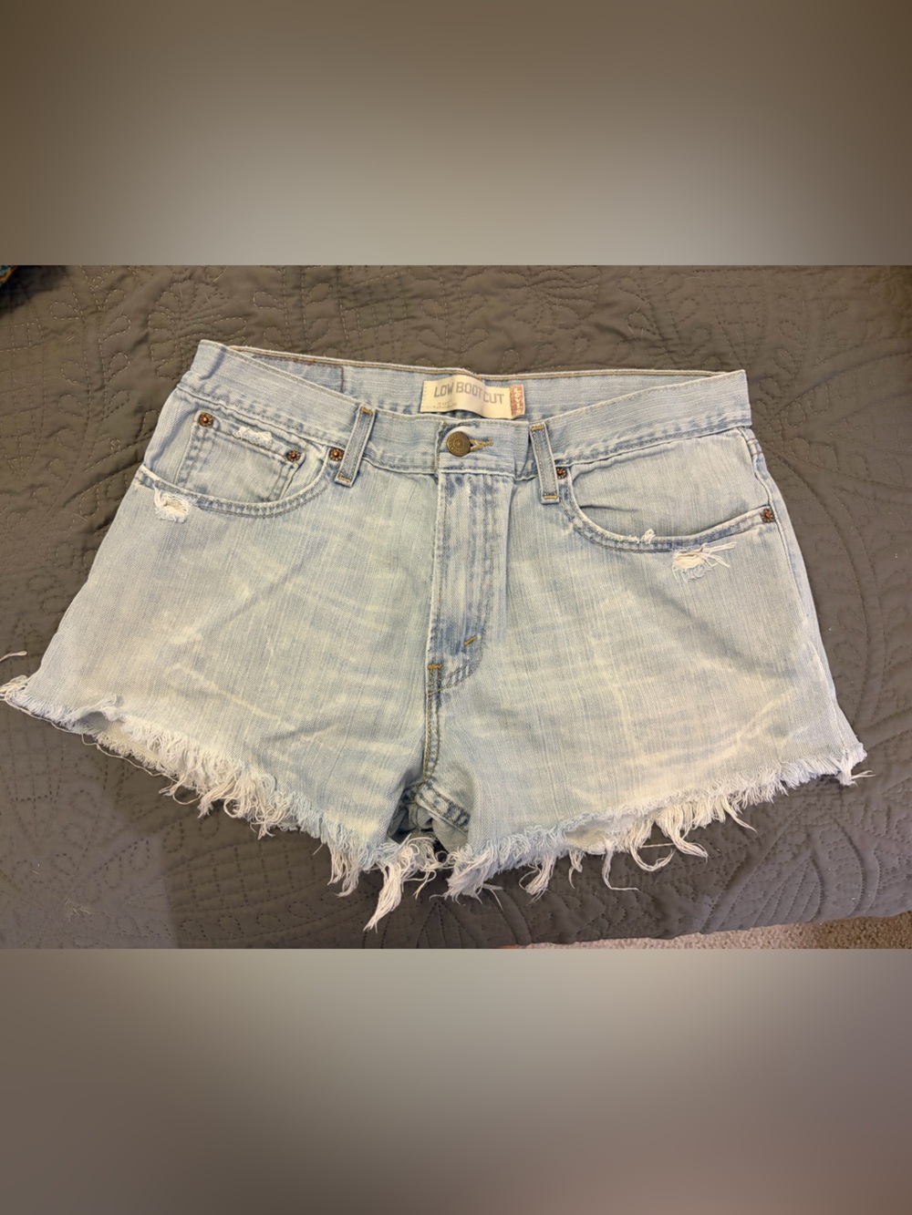 Levi’s Light Wash Distressed Denim Shorts